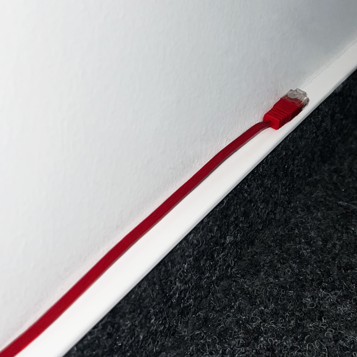 SlimWire - On a skirting board